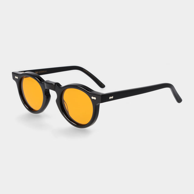 Black sustainable sunglasses orange lenses: Welt | TBD Eyewear